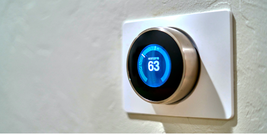 Install a Programmable Thermostat and set the temperature and times that you want the AC to run.